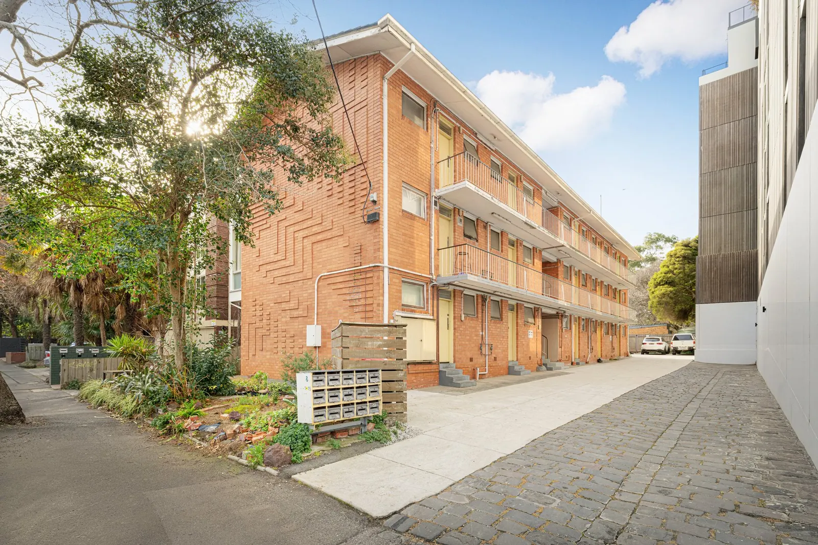 The three-storey brick block of 15 studios at 8 Tivoli Rd
